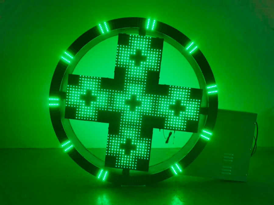 Cruz de farmácia exclusiva DSY3 com aro circular LED e efeitos dinâmicos programáveis.